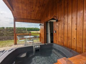 Hot tun at Queen Bee Glamping cabin