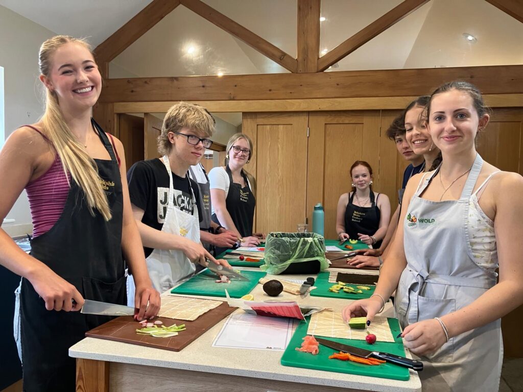 DofE students learning knife skills during residential